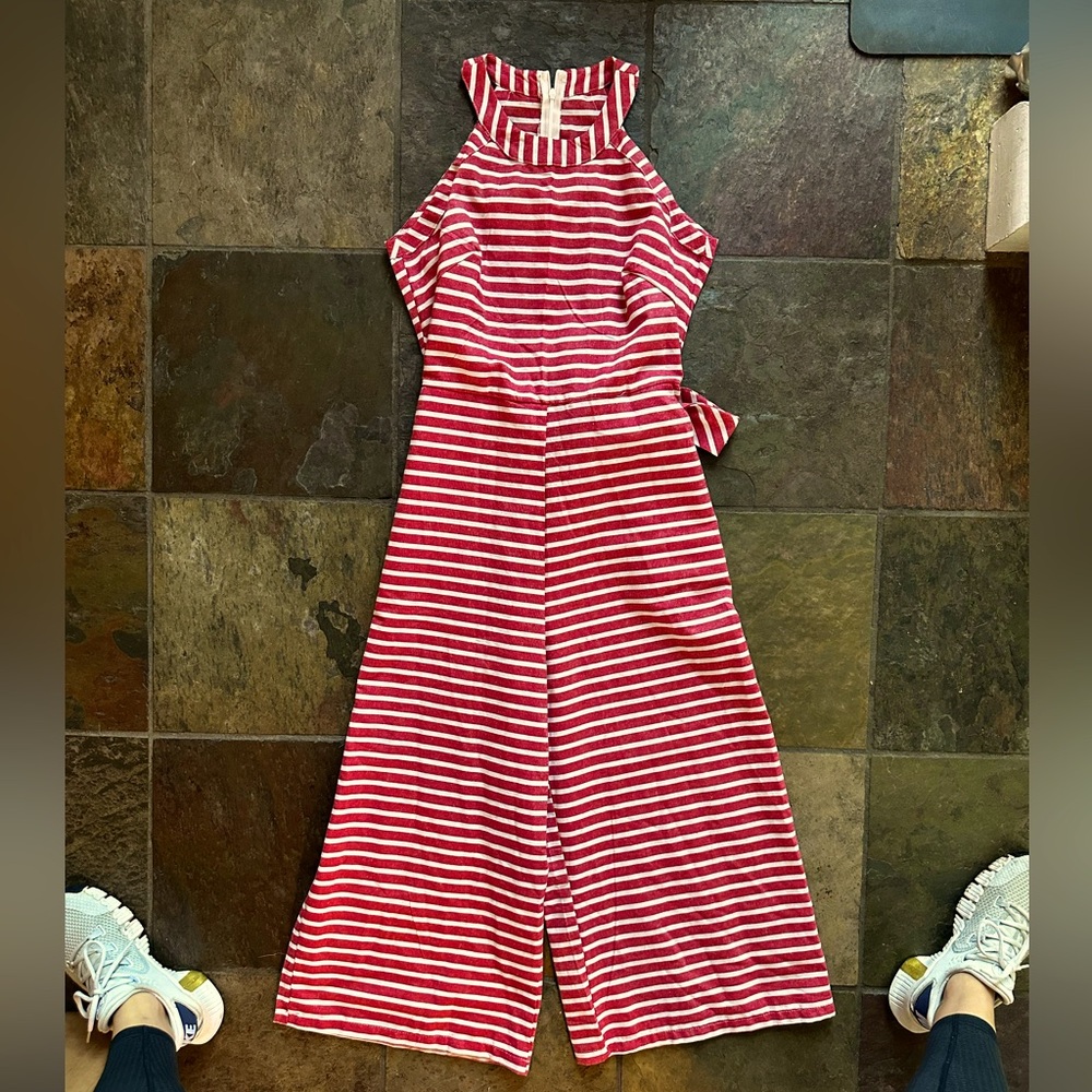 Red Sleeveless Jumpsuit with High Neckline and Wide Legs